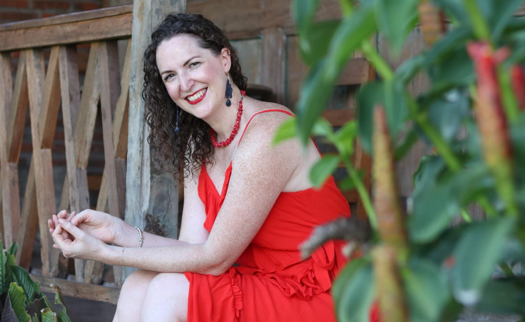 Curly haired lady smiling